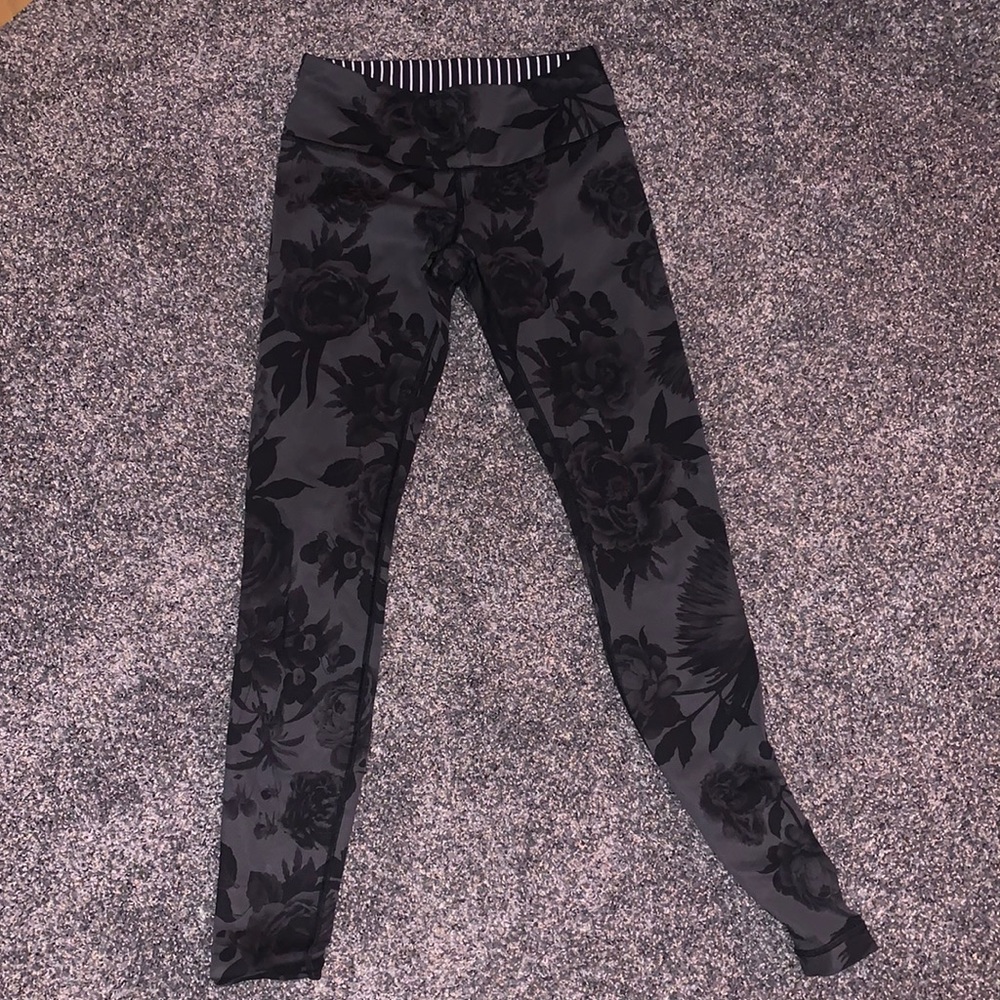 Adorable black, floral Lululemon leggings! Size 4